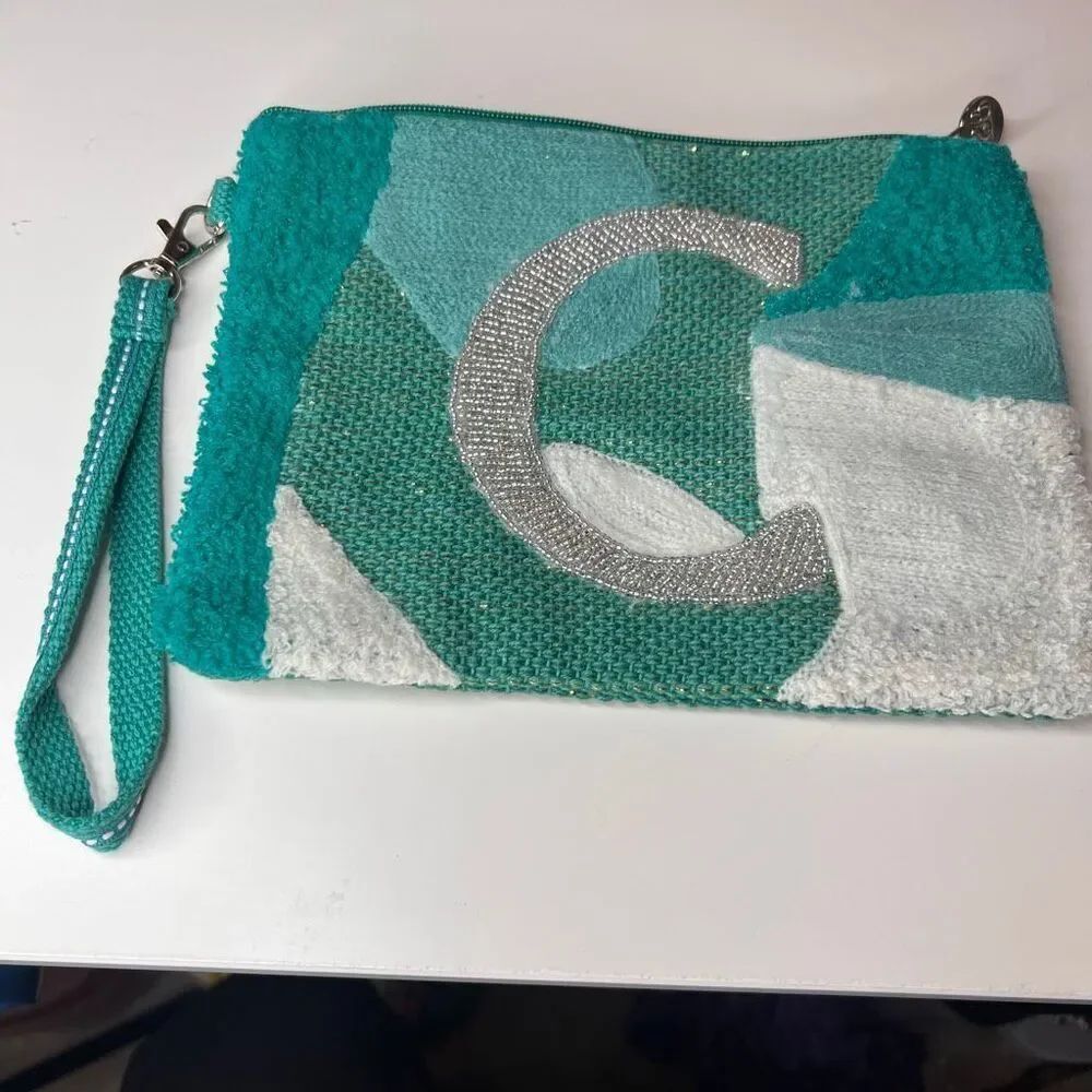 America & Beyond Beaded and Tufted Monogram Pouch with the letter C in a green c